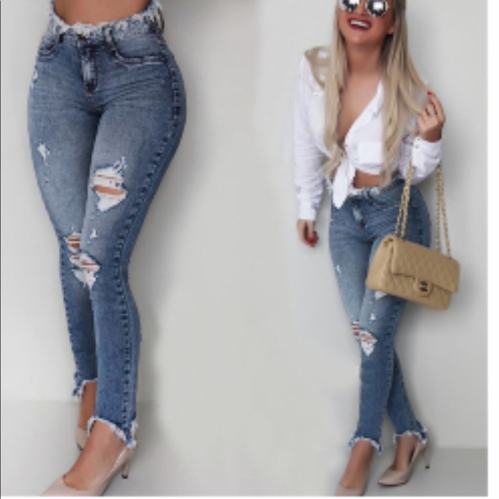 Woman’s distressed jeans